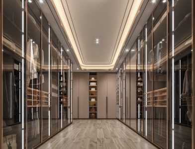 Modern walk-in wardrobe with muted olive green, light beige, and light grey-brown accents