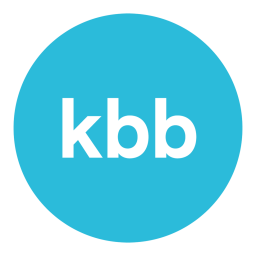 The image features a light blue circle with the white lowercase letters "kbb" centered inside it. The background is plain white, evoking the clean, modern design often seen in fitted wardrobes in London.